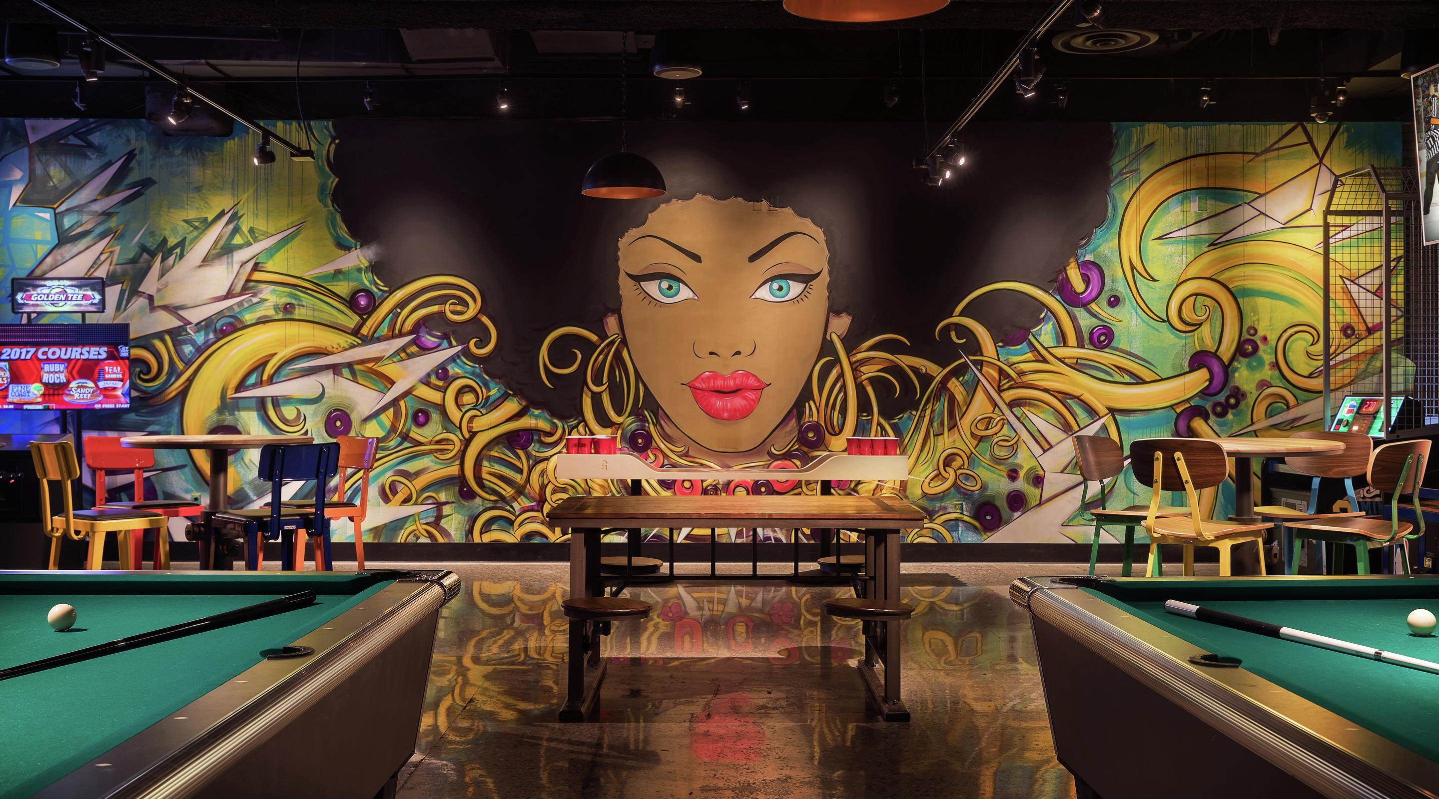 Mural and gaming area at Level Up inside MGM Grand.