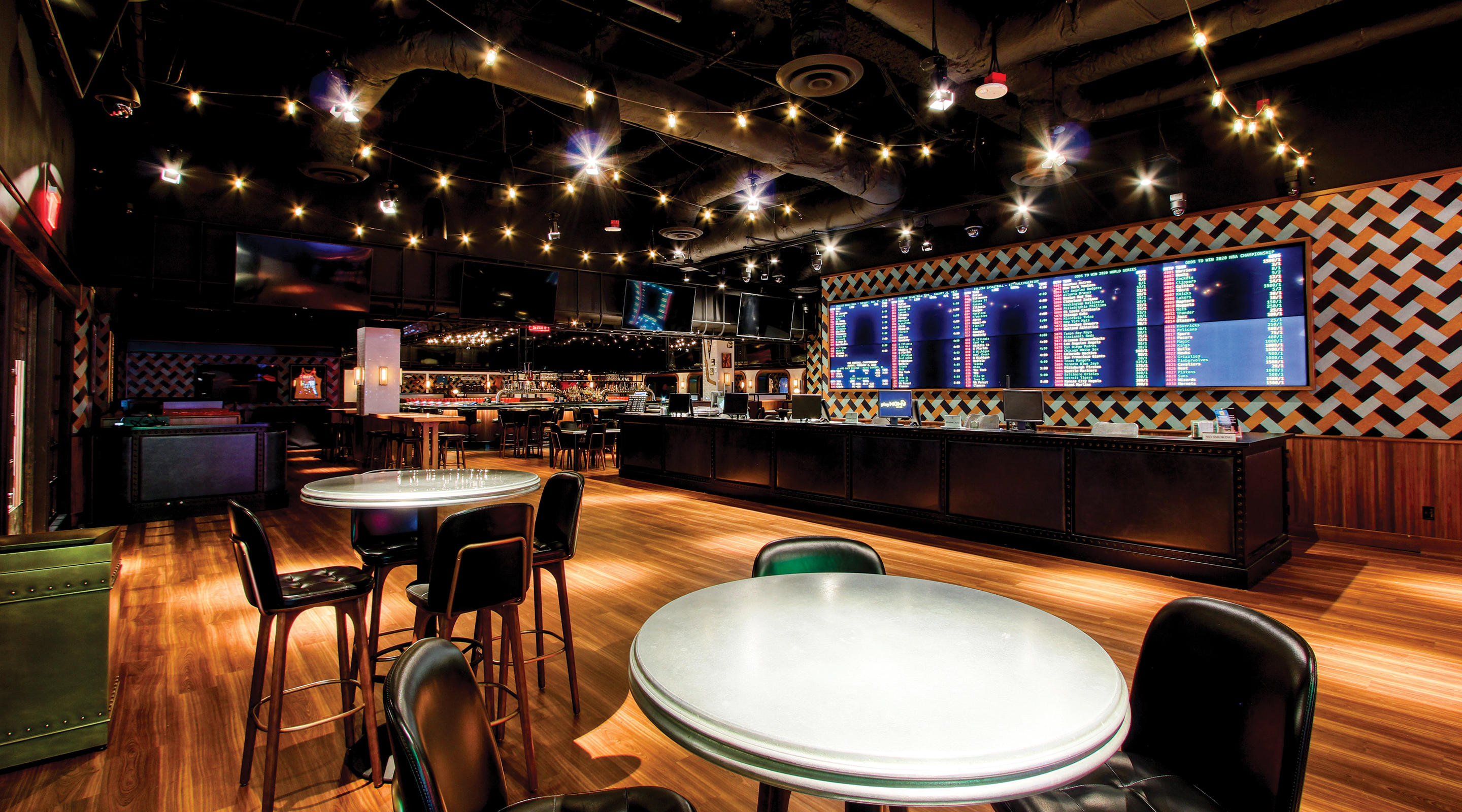 A view of the seating area in front of the main sportsbar area and betting display.