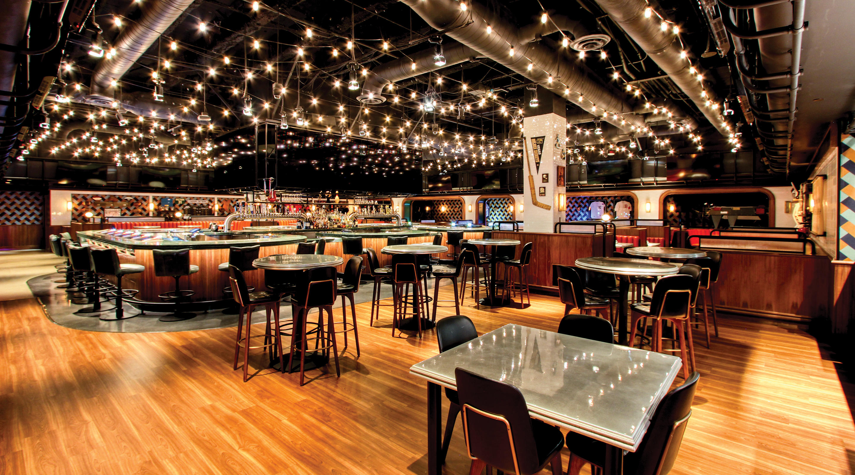 Tables and other seating options at BetMGM Sportsbook & Lounge.